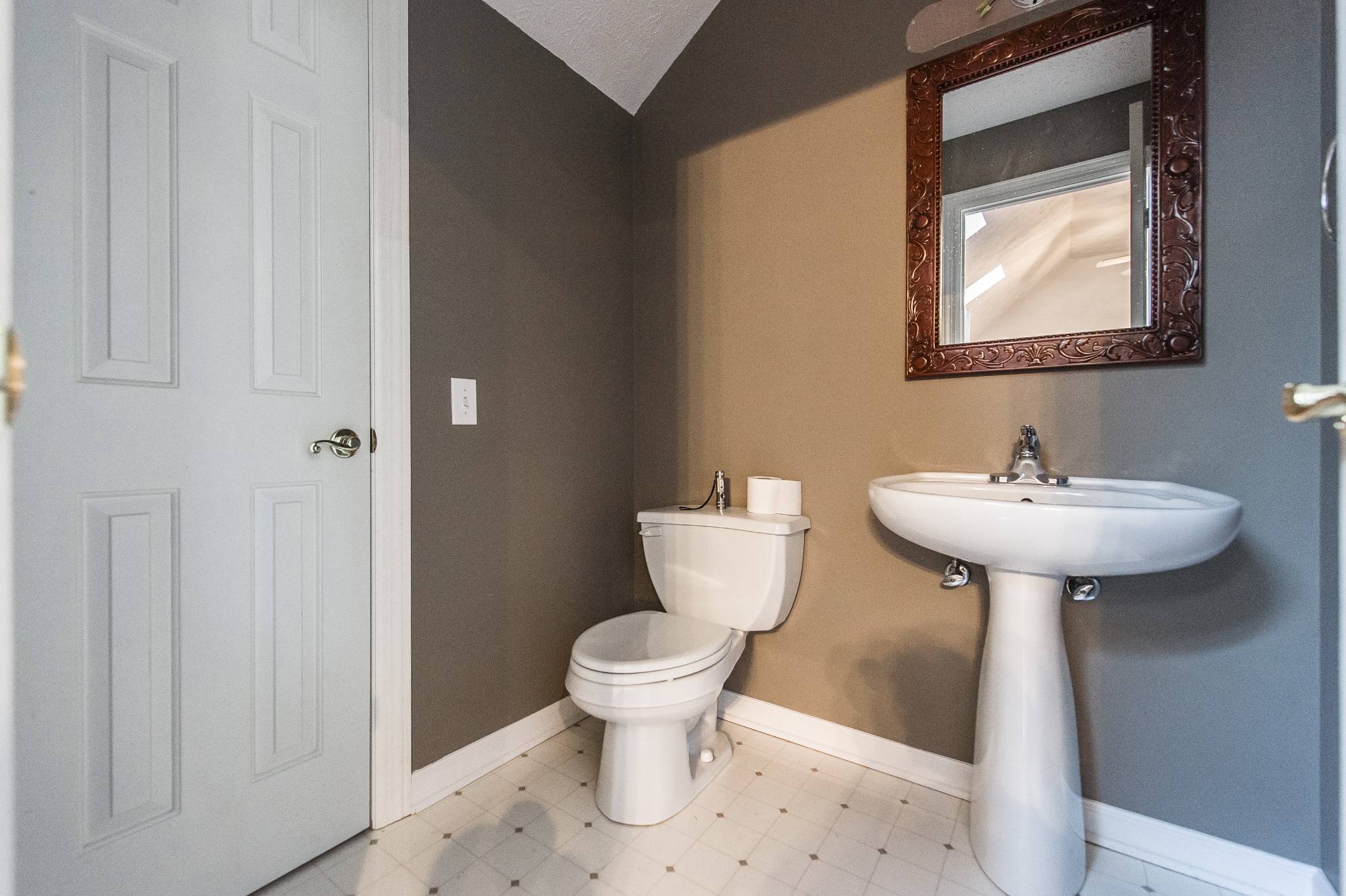 4305 Franklin Road Lebanon, TN 37090 - Photo 44 of 67 a bathroom with a sink toilet and a mirror