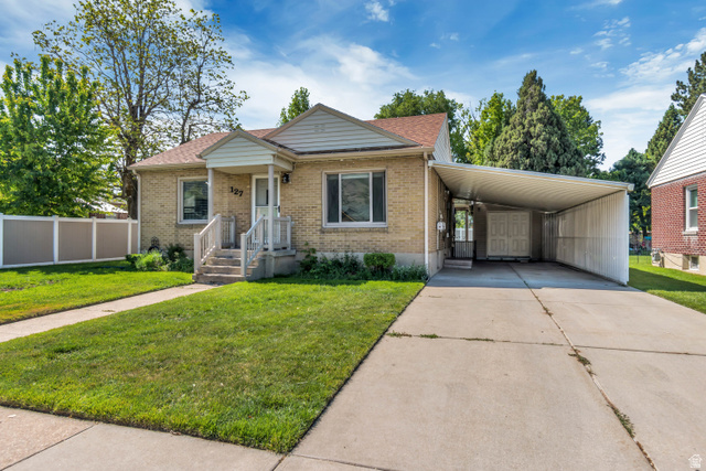 127 West 300 North Springville, UT 84663 - Photo 5 of 24 Brick exterior with a covered front porch featuring white railings