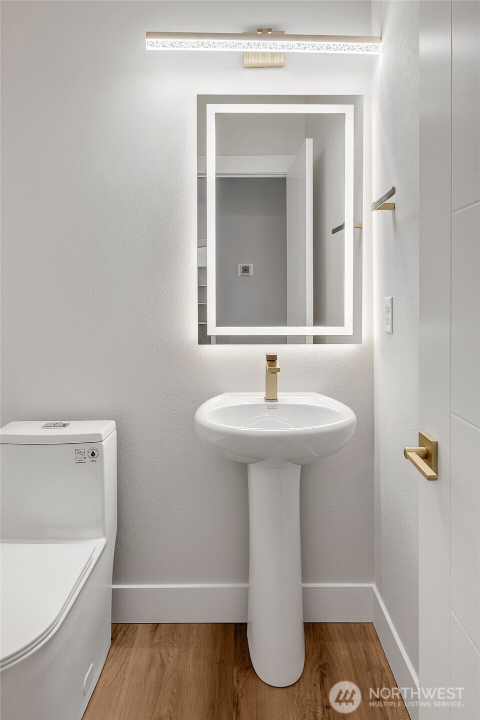 21408 39th Drive Southeast, Unit B Bothell, WA 98021 - Photo 21 of 34 a bathroom with a sink and a mirror