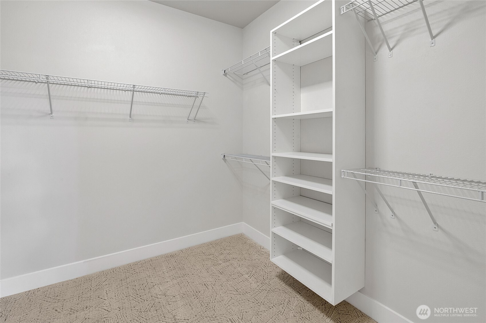 21408 39th Drive Southeast, Unit B Bothell, WA 98021 - Photo 24 of 34 a view of an empty walk in closet