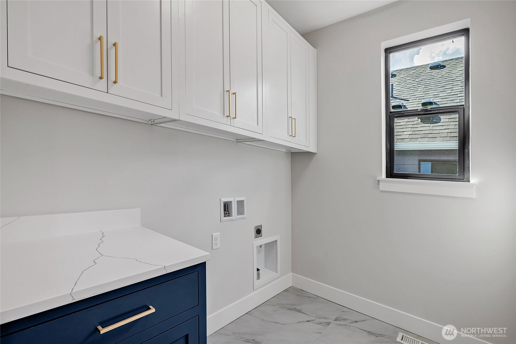 21408 39th Drive Southeast, Unit B Bothell, WA 98021 - Photo 25 of 34 a view of cabinets and utility room with wooden floor