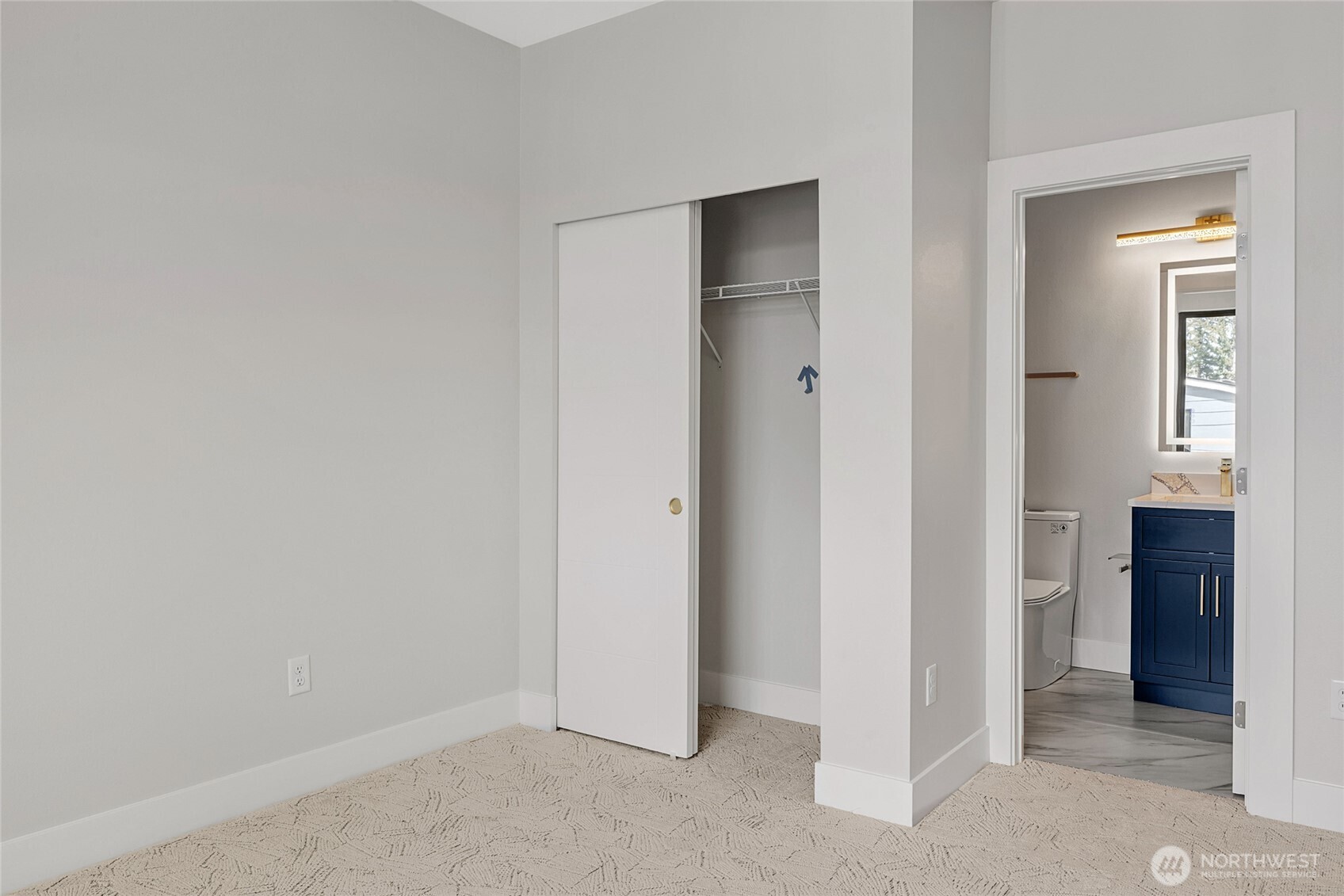 21408 39th Drive Southeast, Unit B Bothell, WA 98021 - Photo 26 of 34 a view of an empty room with closet and mirror