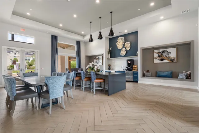 a view of an house with backyard and a garden