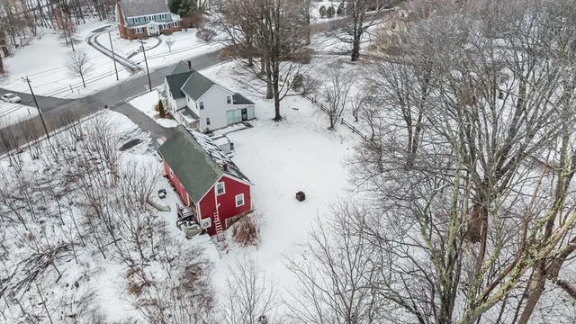 a view of a backyard of the house