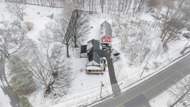 a view of entryway with wooden fence