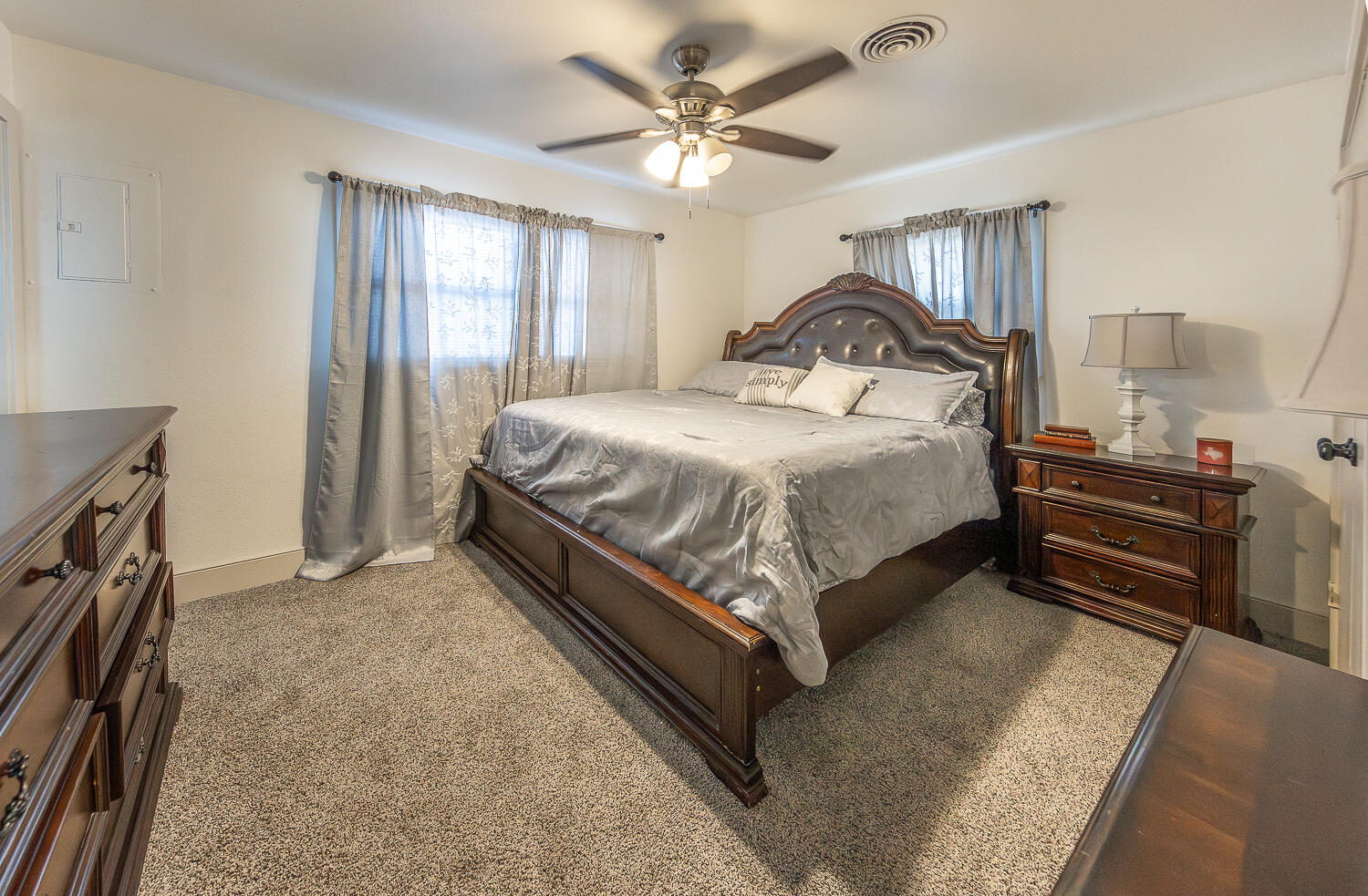 1710 43rd Street Lubbock, TX 79412 - Photo 14 of 20 a bedroom with a bed and window