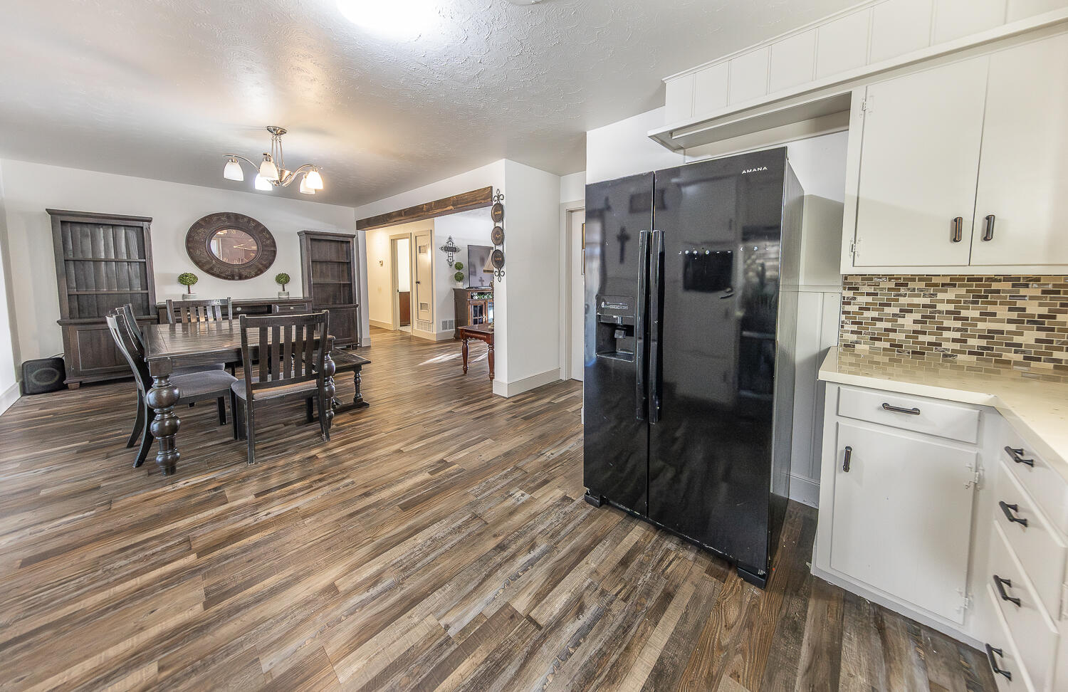 1710 43rd Street Lubbock, TX 79412 - Photo 7 of 20 a very nice looking room with wooden floor and furniture