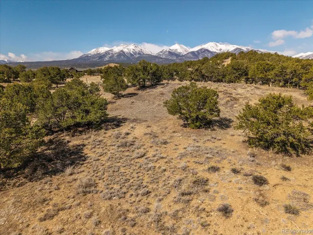 a view of a lake with mountains in the background