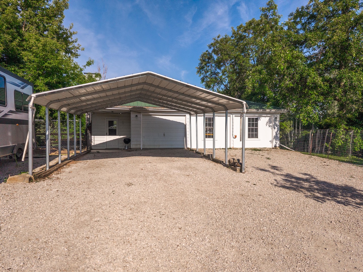22037 East 2600 N Road Odell, IL 60460 - Photo 53 of 59 a front view of a house with a yard and garage