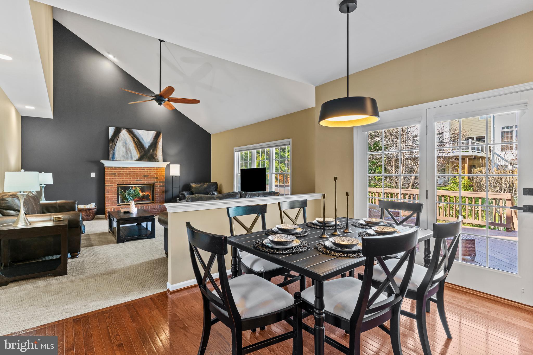 42714 Freedom Street Chantilly, VA 20152 - Photo 13 of 47 a view of a dining room with furniture window and wooden floor