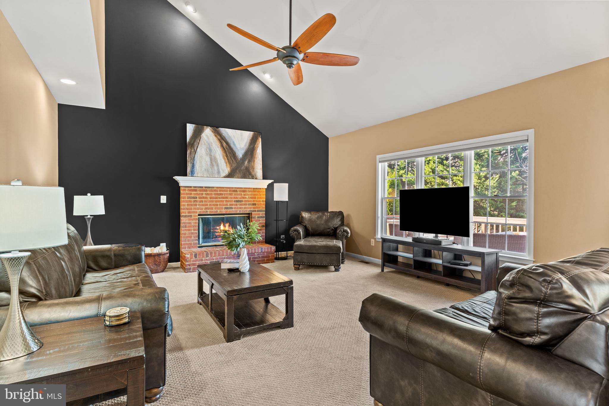 42714 Freedom Street Chantilly, VA 20152 - Photo 14 of 47 a living room with furniture and a flat screen tv