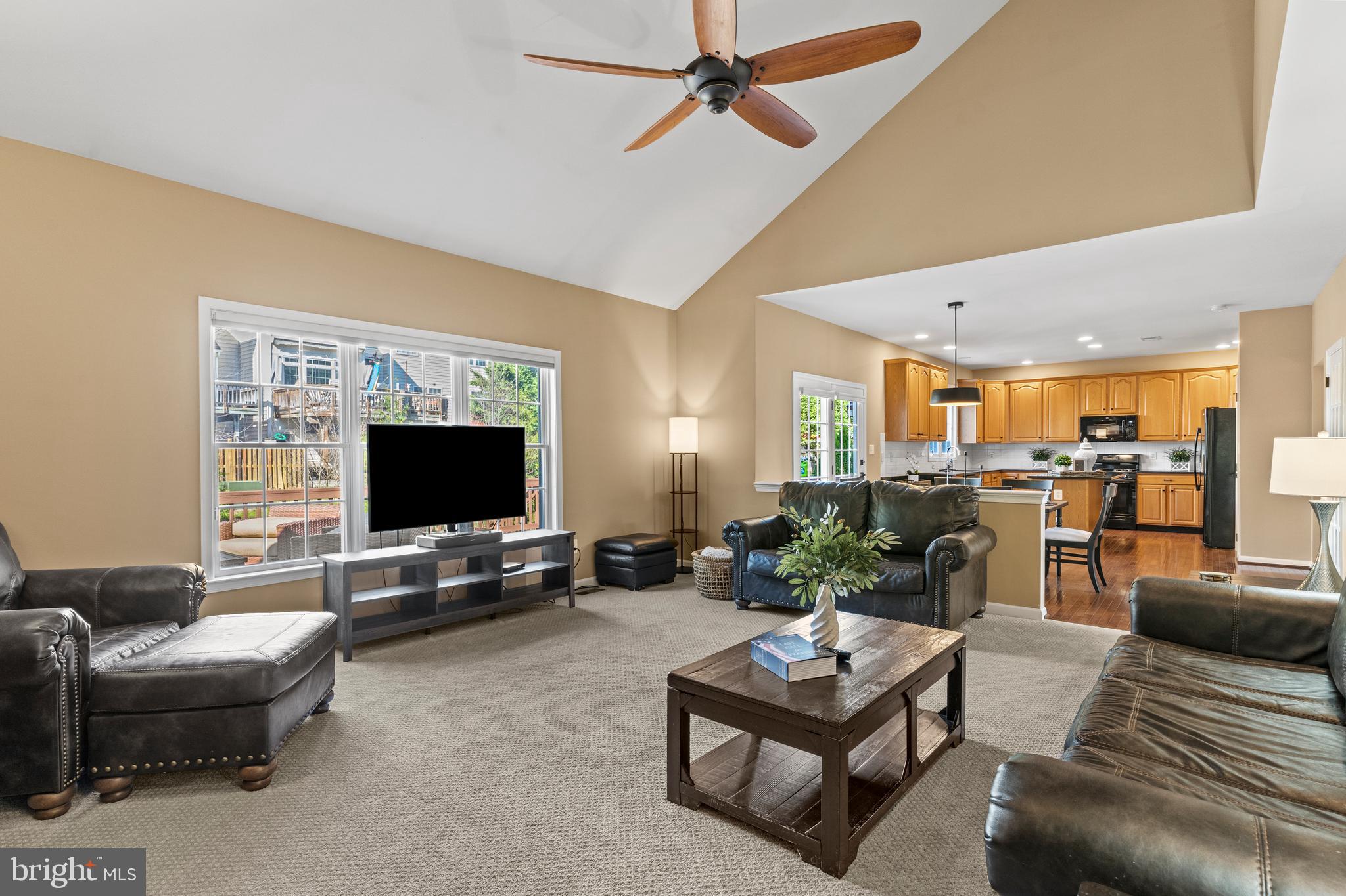 42714 Freedom Street Chantilly, VA 20152 - Photo 15 of 47 a living room with furniture and a flat screen tv