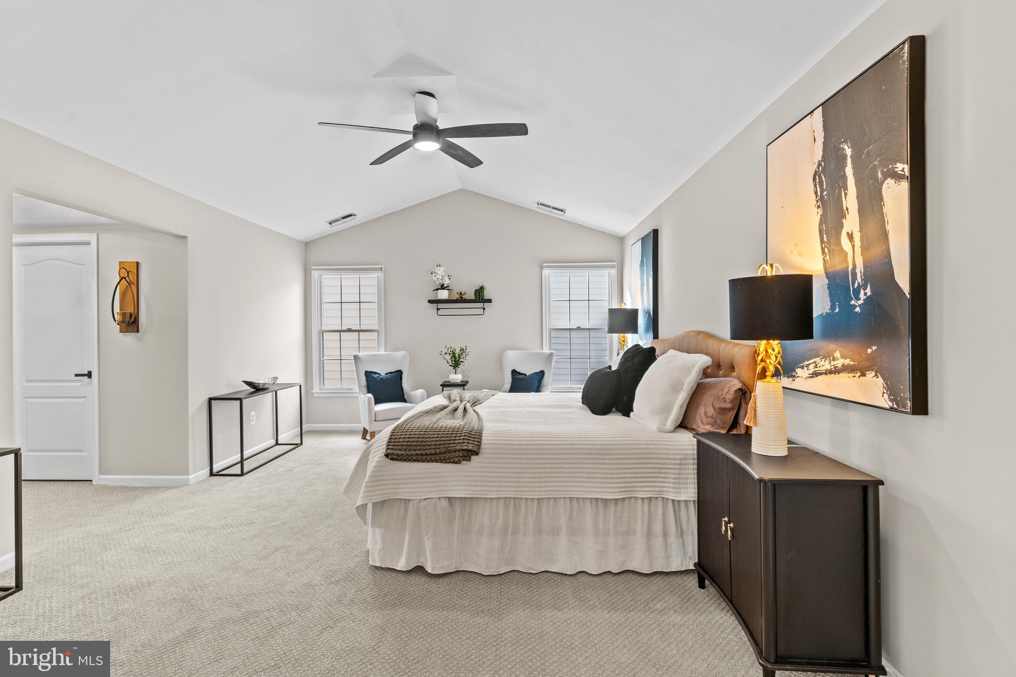 42714 Freedom Street Chantilly, VA 20152 - Photo 19 of 47 a bedroom with a bed and flat screen tv