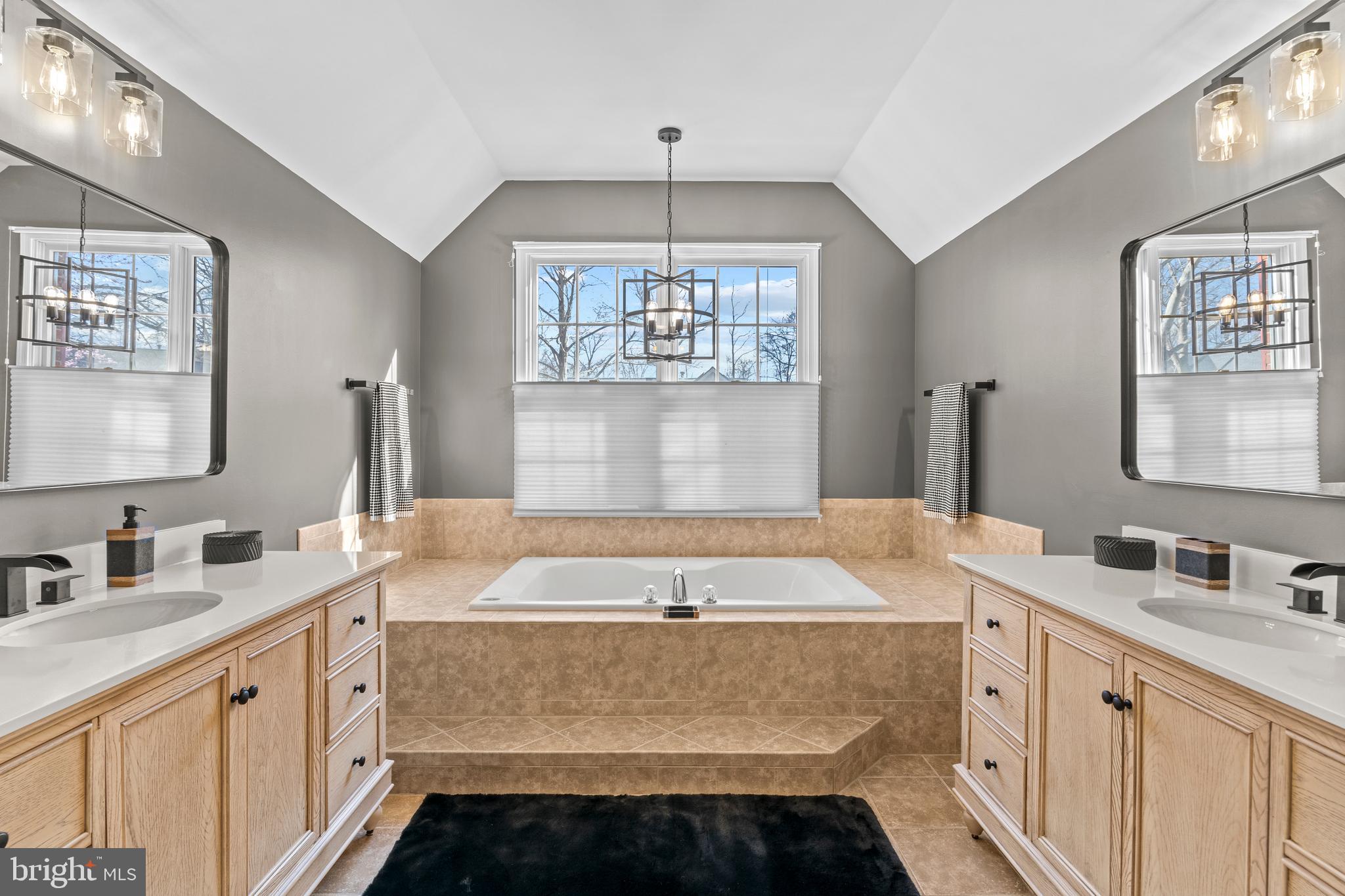42714 Freedom Street Chantilly, VA 20152 - Photo 22 of 47 a bathroom with a sink and a mirror