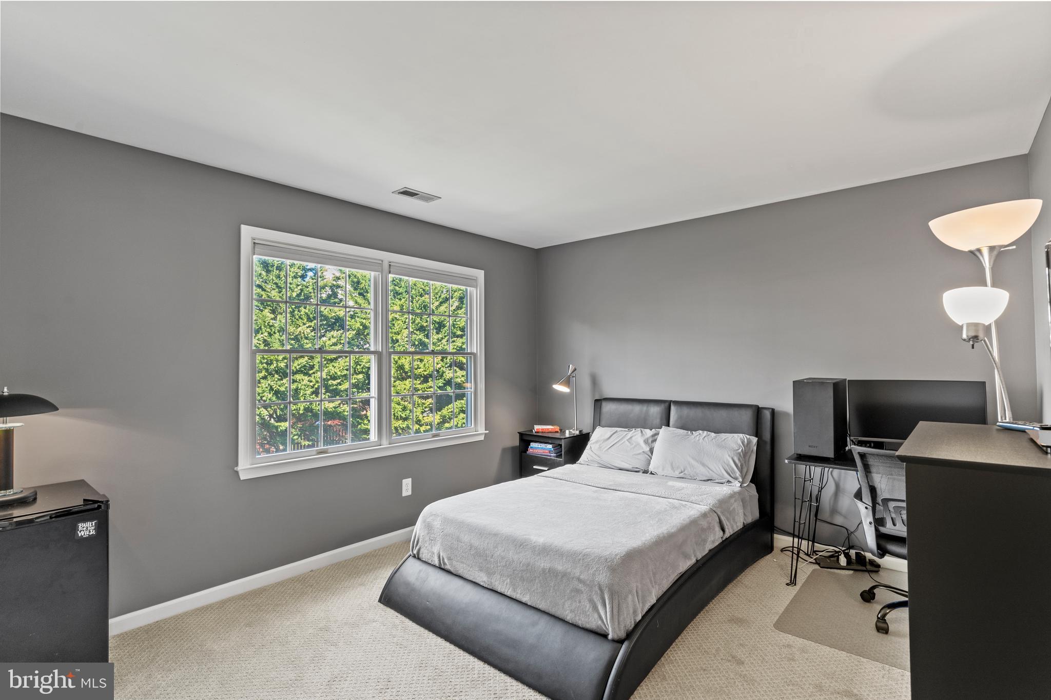 42714 Freedom Street Chantilly, VA 20152 - Photo 25 of 47 a bedroom with a bed and a window