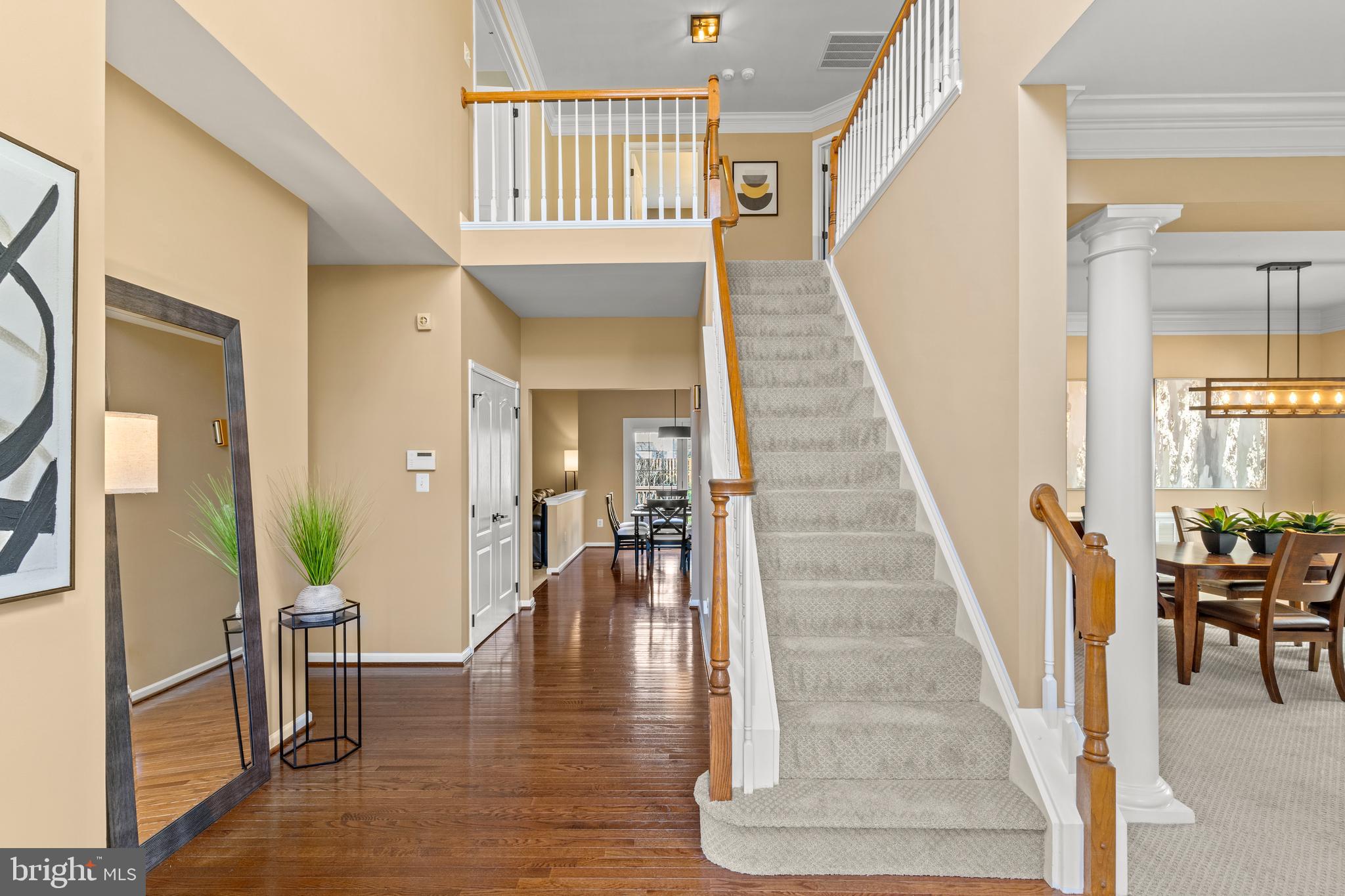 42714 Freedom Street Chantilly, VA 20152 - Photo 3 of 47 a view of entryway and hall with wooden floor