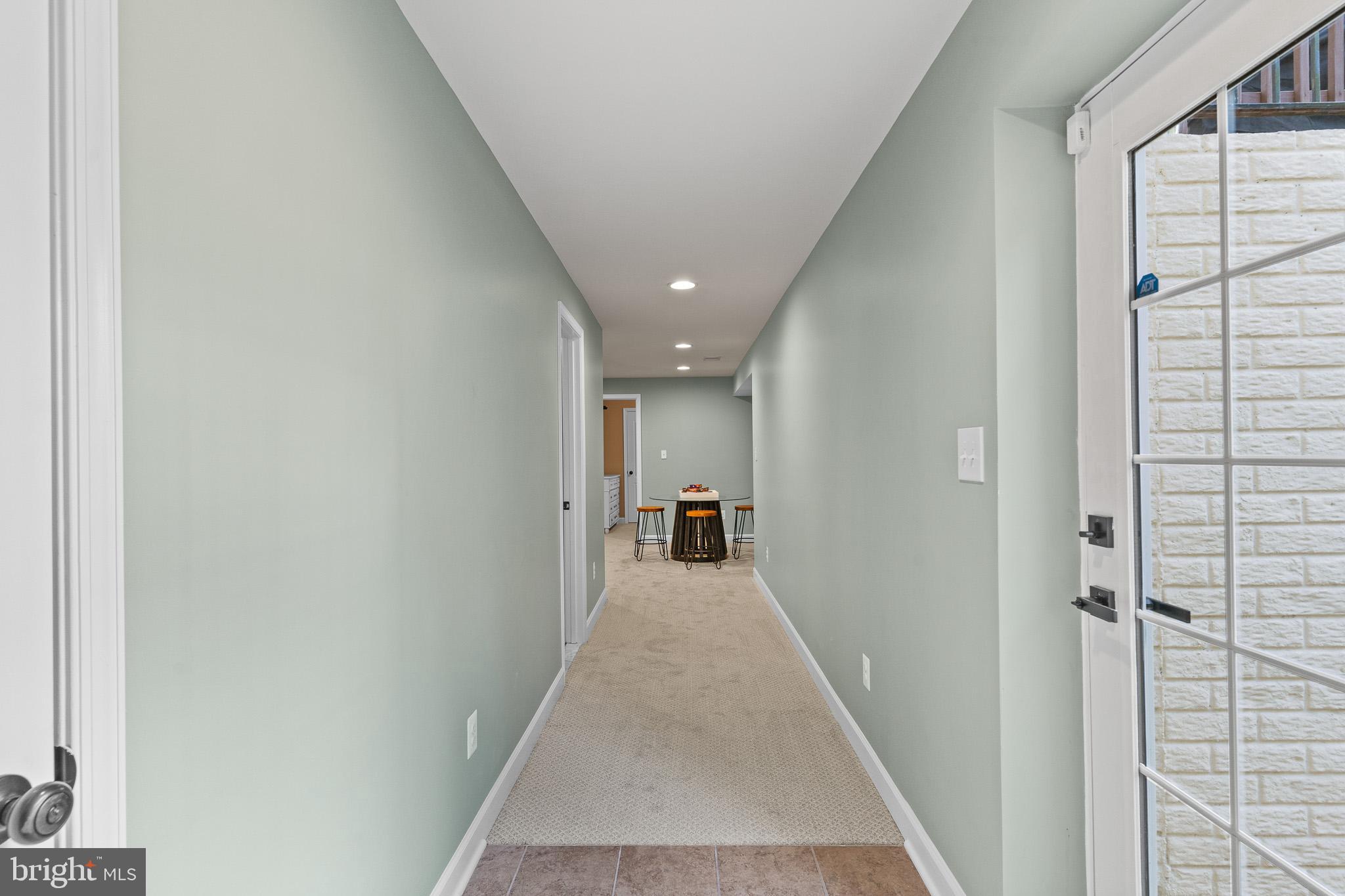 42714 Freedom Street Chantilly, VA 20152 - Photo 38 of 47 a view of a hallway with wooden shelves