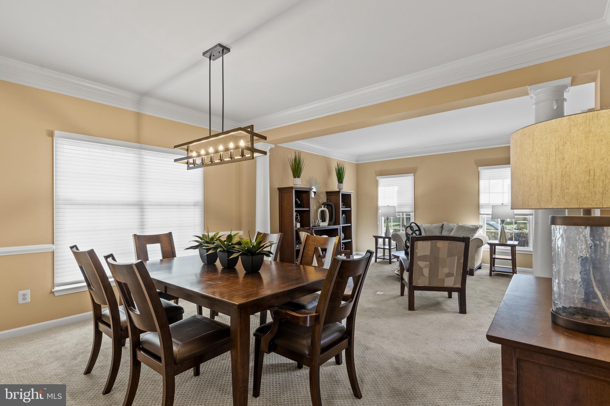 42714 Freedom Street Chantilly, VA 20152 - Photo 7 of 47 a view of a dining room with furniture and wooden floor