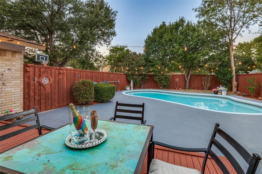 37 Merrie Circle Richardson, TX 75081 - Photo 23 of 28 View of pool featuring a patio, a fenced backyard, and outdoor dining area
