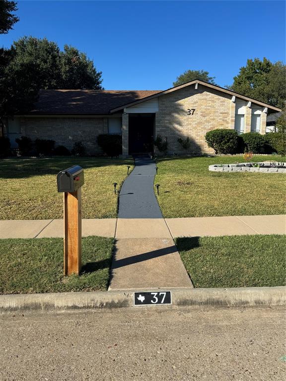 37 Merrie Circle Richardson, TX 75081 - Photo 28 of 28 Mid-century inspired home with a front yard and brick siding