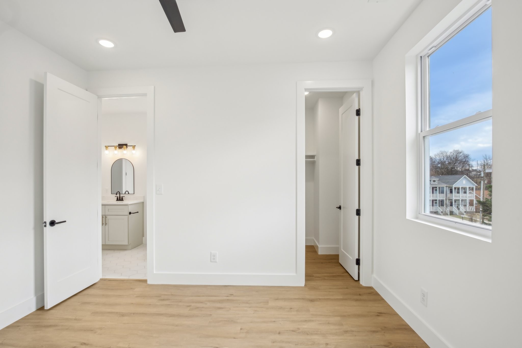 914 Smiley Street Nashville, TN 37206 - Photo 25 of 32 a view of a hallway with wooden floor and closet