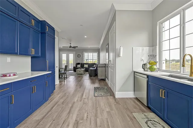 a kitchen with a refrigerator and a cabinets