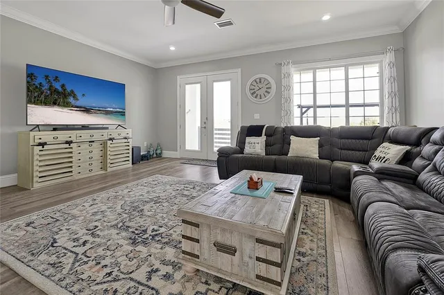 a living room with furniture and a window