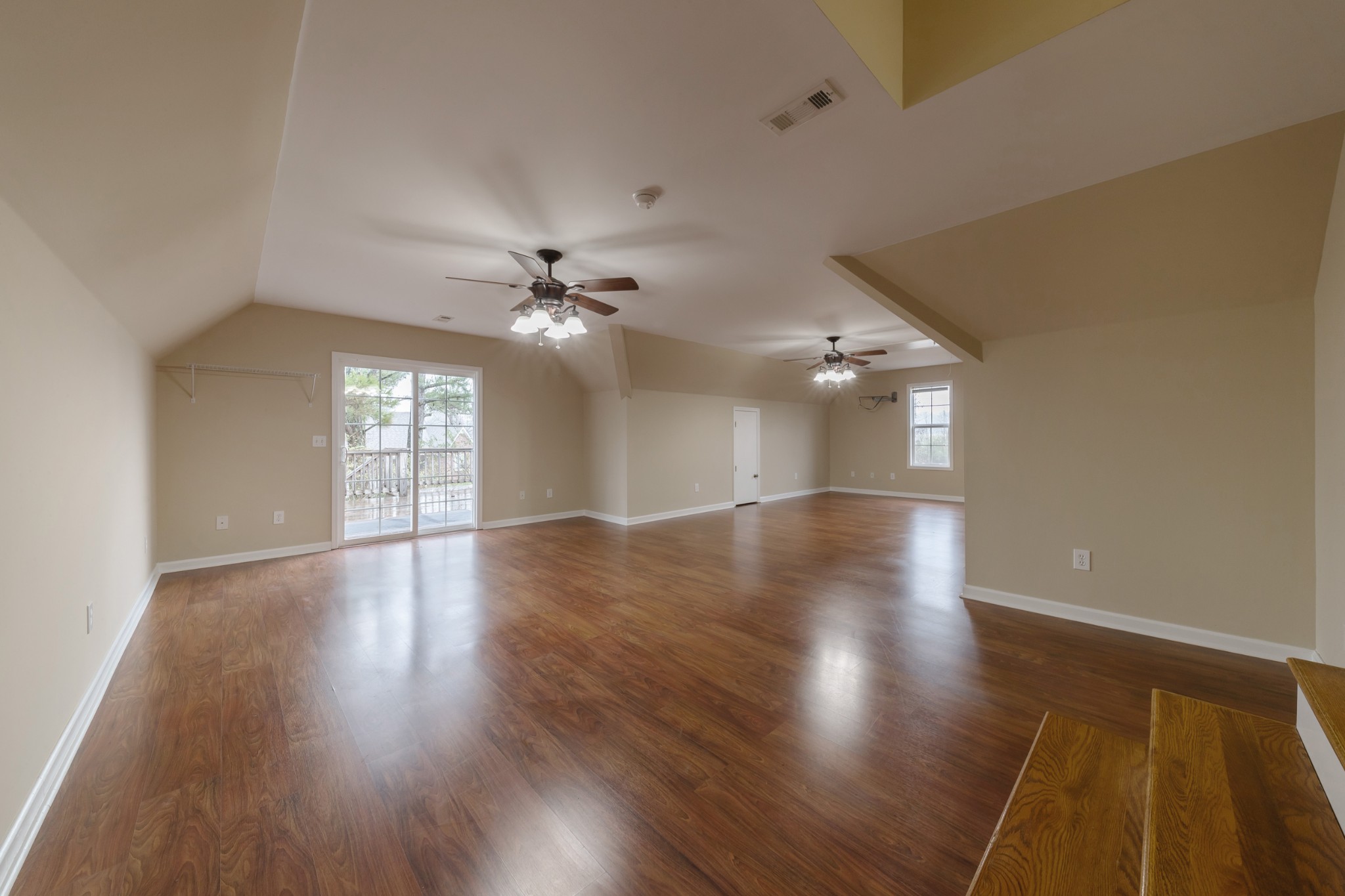 415 Duck River Road Manchester, TN 37355 - Photo 24 of 34 a view of livingroom with hardwood floor and ceiling fan