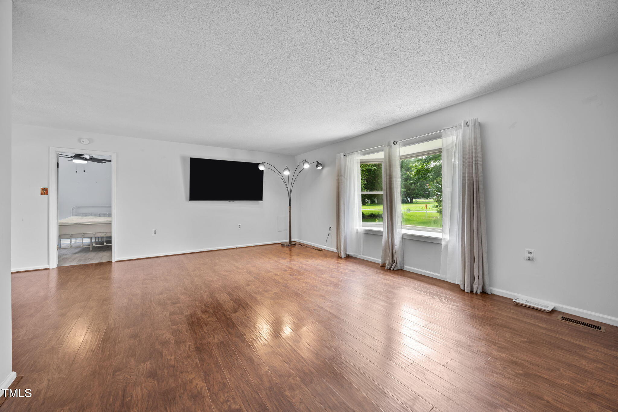 1413 Bud Hawkins Road Dunn, NC 28334 - Photo 10 of 51 Spacious Living Room with picture window. Split Bedroom plan.