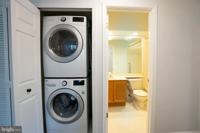 a bathroom with a sink a toilet and a bathtub