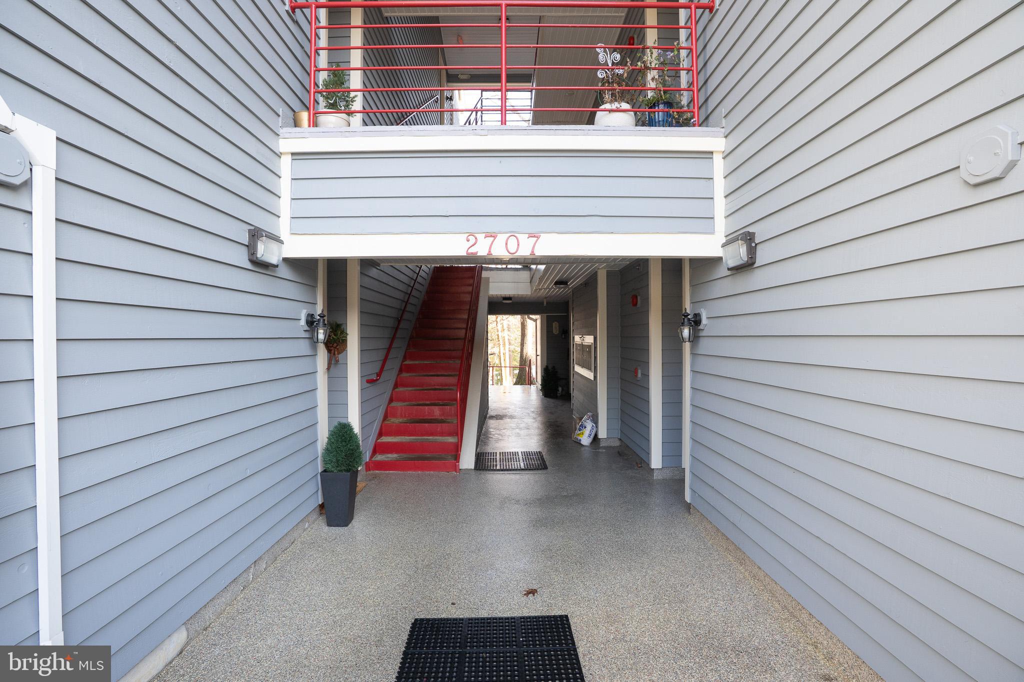 2707 Summerview Way, Unit 101 Annapolis, MD 21401 - Photo 21 of 24 a view of a house with a balcony