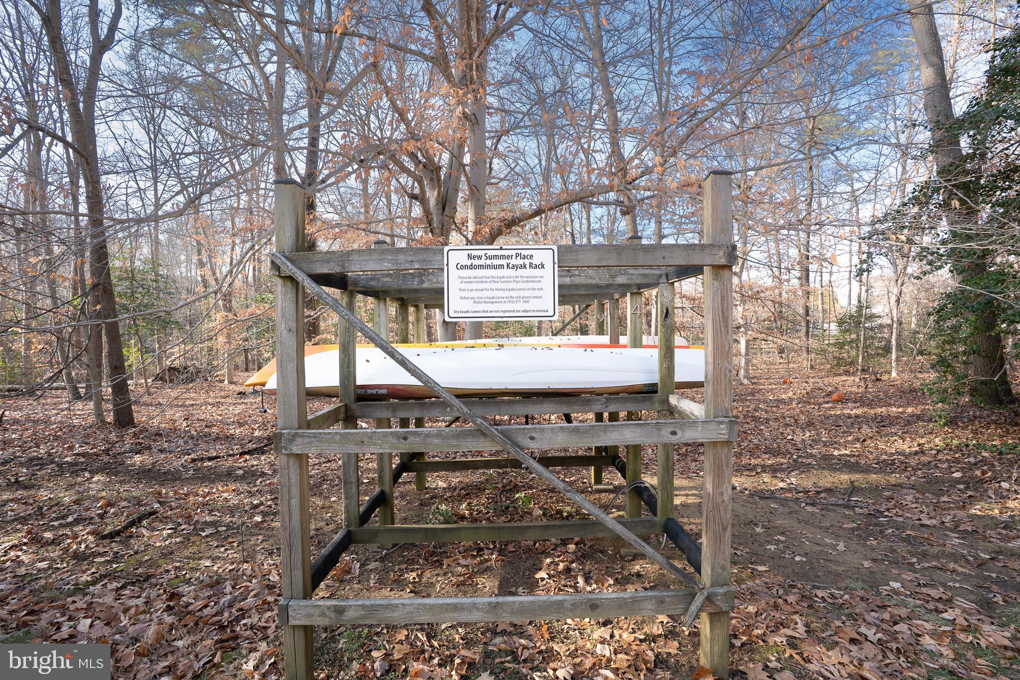2707 Summerview Way, Unit 101 Annapolis, MD 21401 - Photo 24 of 24 a view of a backyard with sitting area