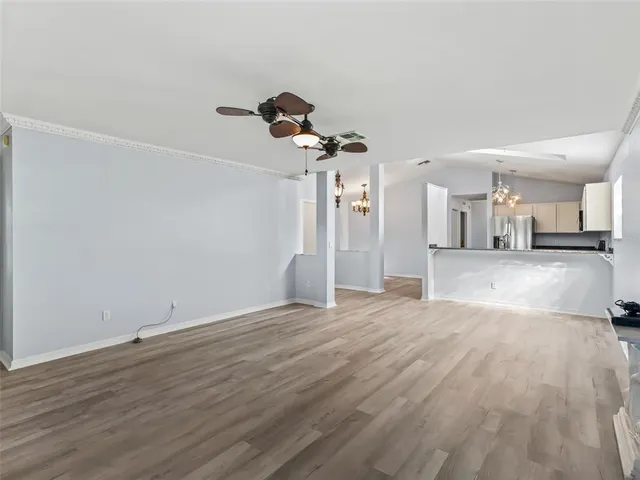 a view of a livingroom with wooden floor