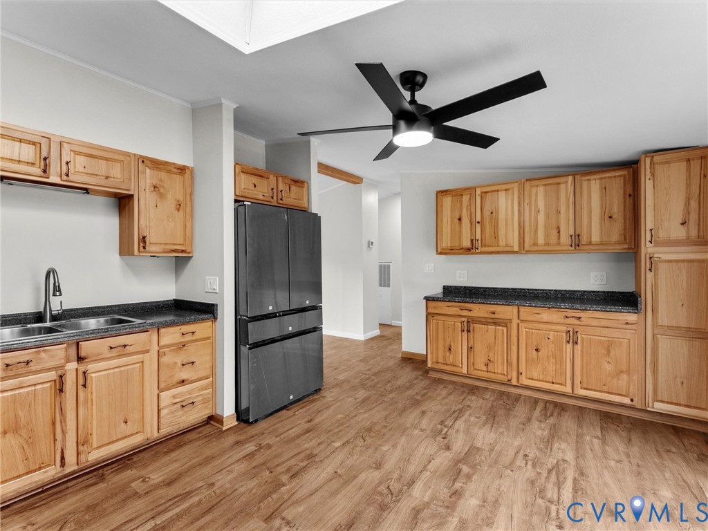 4772 Carsley Road Waverly, VA 23890 - Photo 11 of 38 Kitchen with freestanding refrigerator, dark count