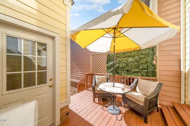 a view of a two chairs in the balcony