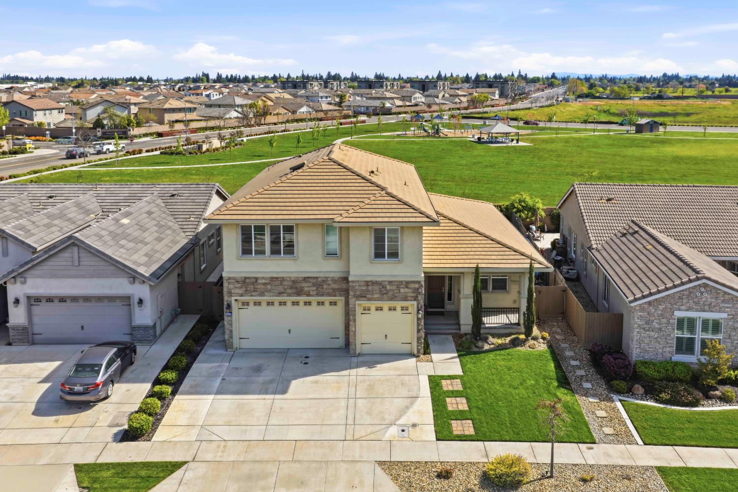 2012 Van Ruiten Drive Lodi, CA 95242 - Photo 42 of 49 an aerial view of a house with a garden and lake view