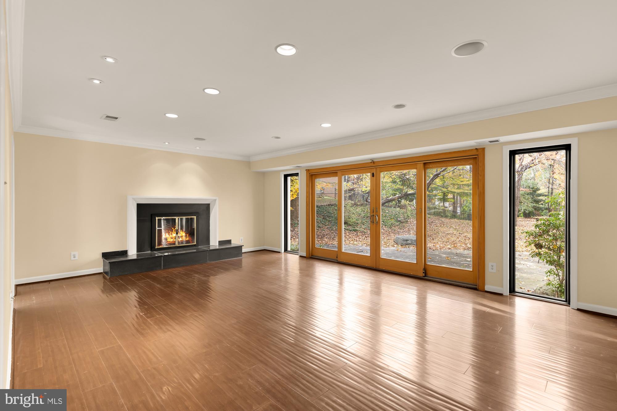 1434 Kirby Road McLean, VA 22101 - Photo 13 of 53 a view of an empty room with wooden floor and a window