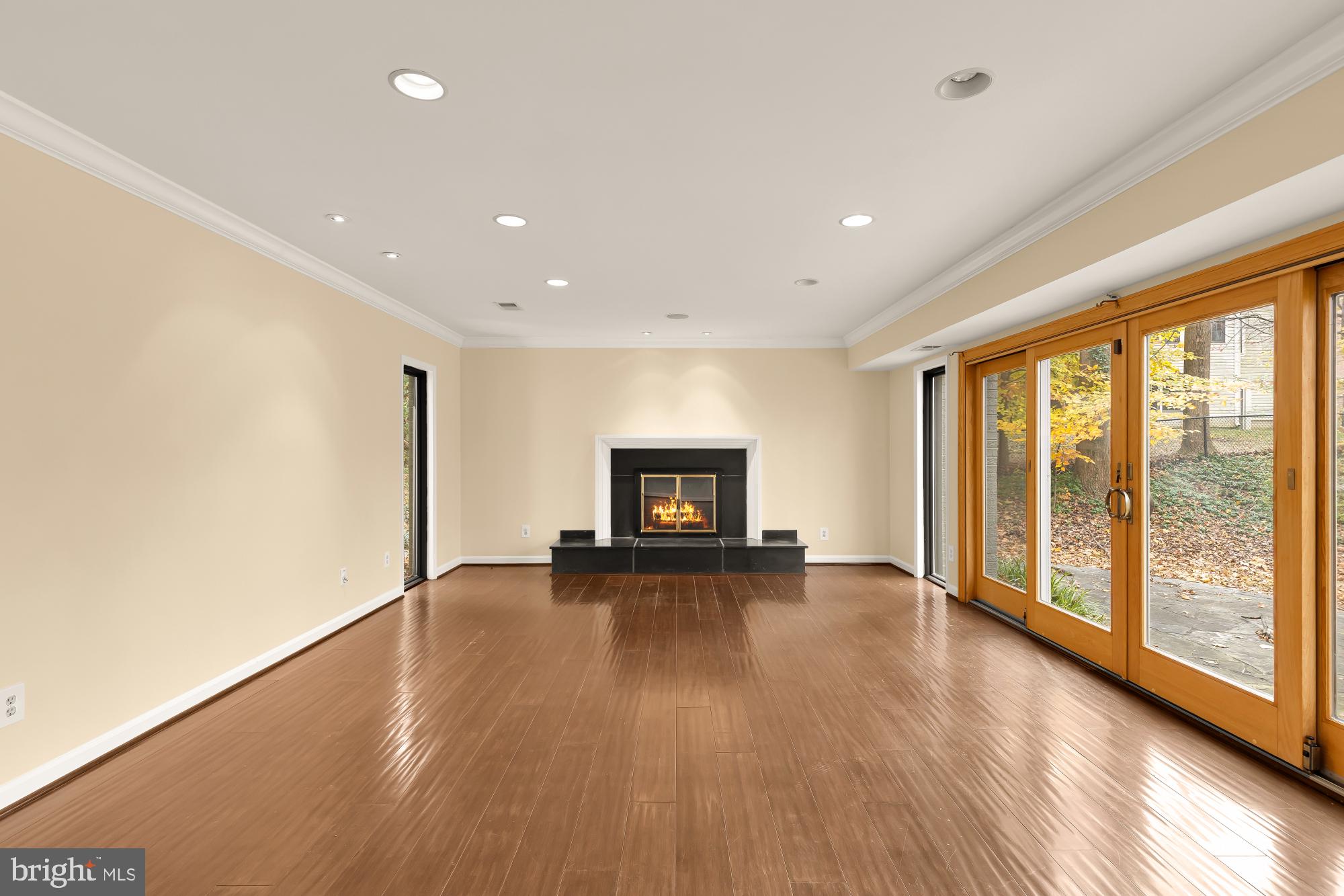 1434 Kirby Road McLean, VA 22101 - Photo 14 of 53 a view of an empty room with wooden floor and a window