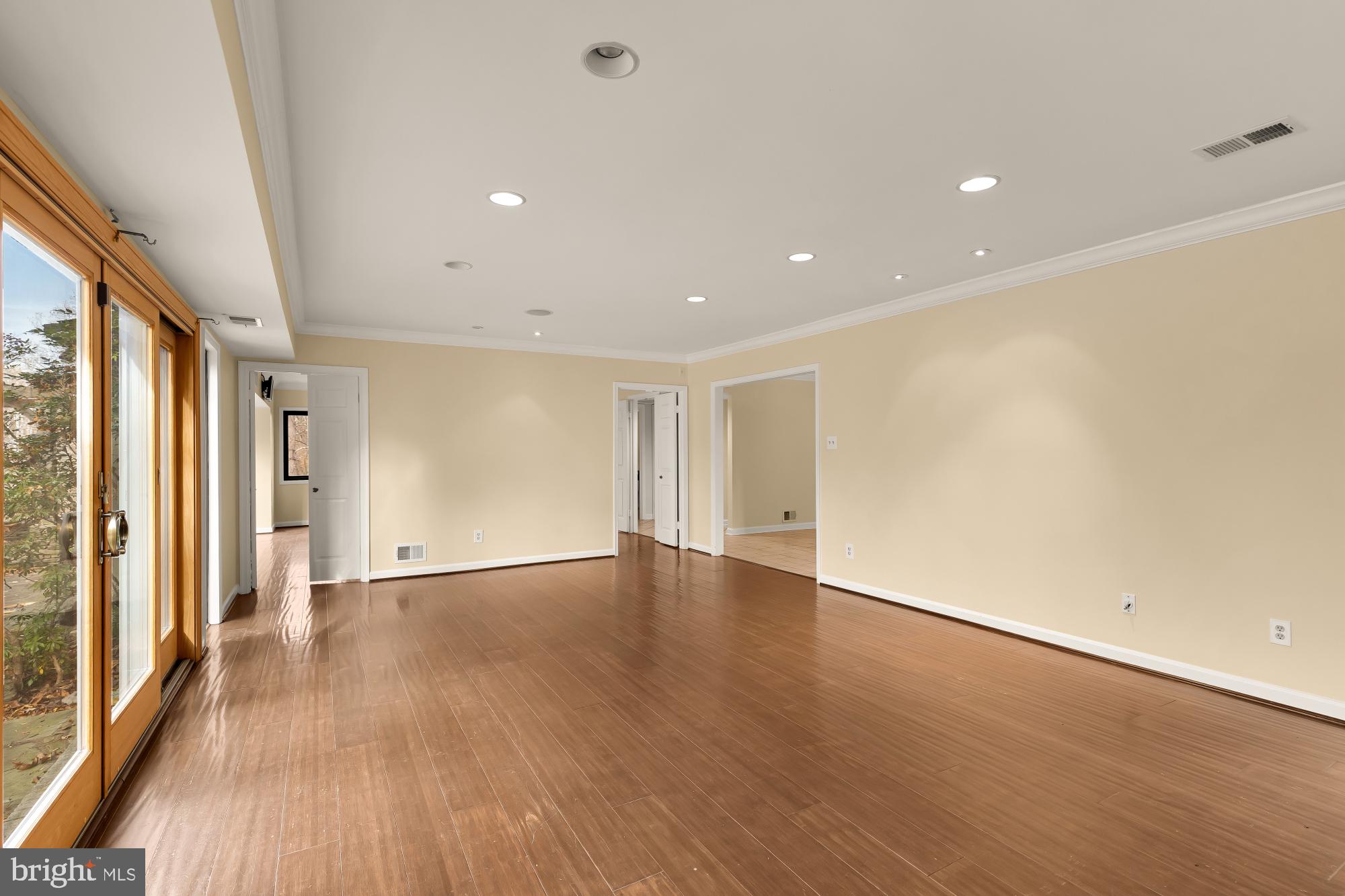 1434 Kirby Road McLean, VA 22101 - Photo 15 of 53 a view of an empty room with wooden floor and a window