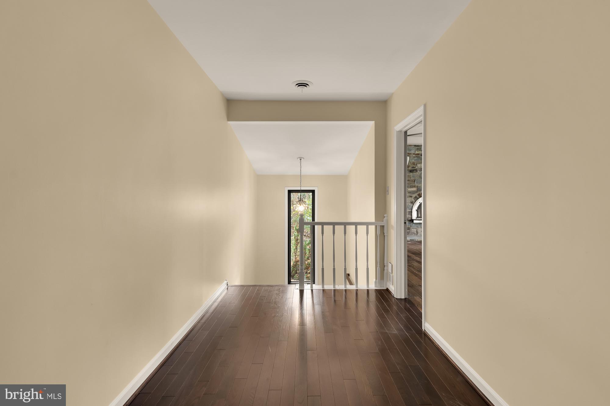 1434 Kirby Road McLean, VA 22101 - Photo 25 of 53 a view of a hallway with wooden floor