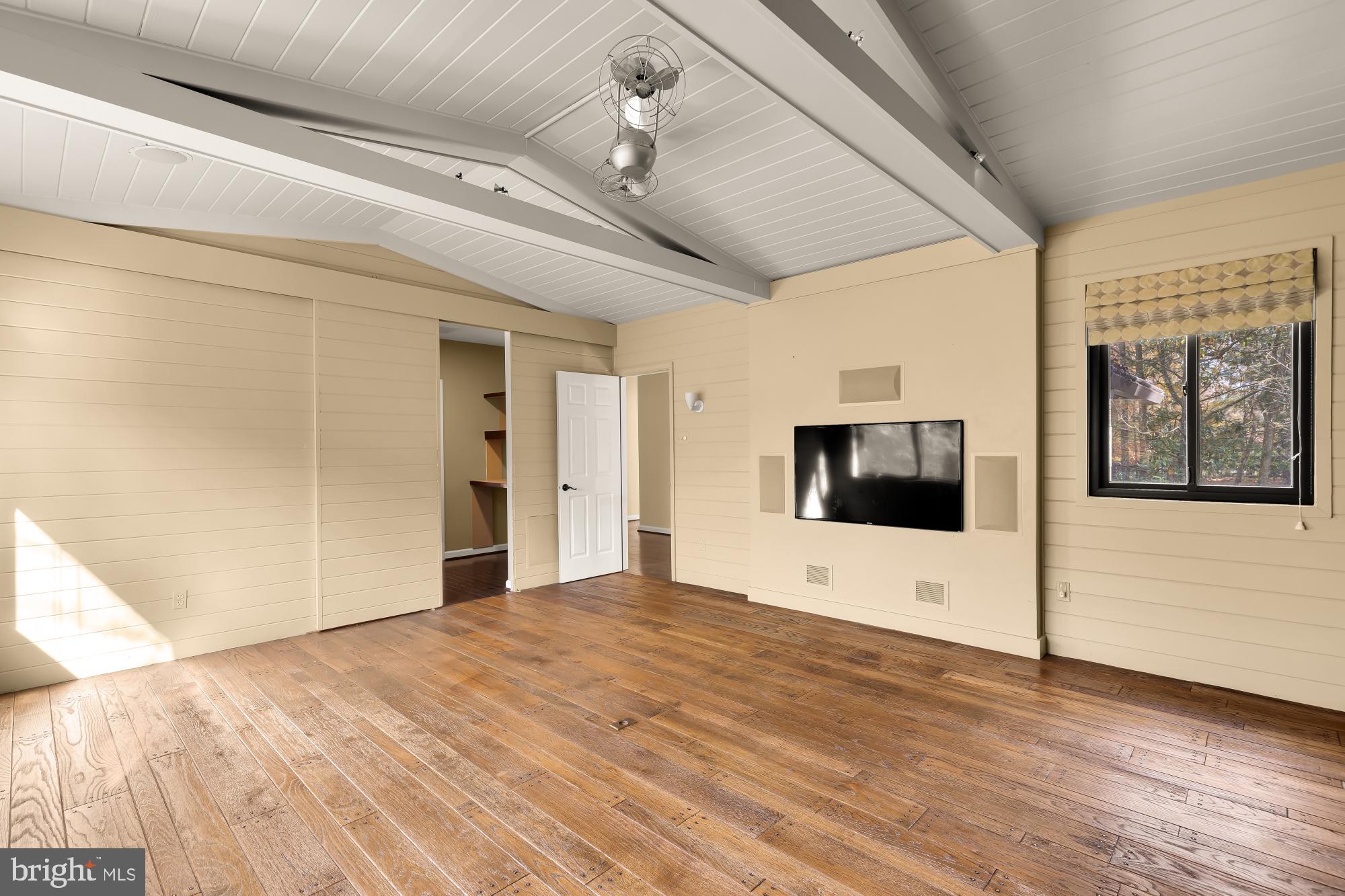 1434 Kirby Road McLean, VA 22101 - Photo 28 of 53 a view of an empty room with wooden floor and a window