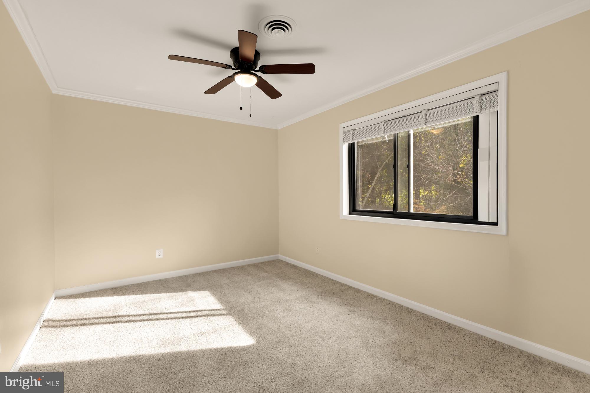 1434 Kirby Road McLean, VA 22101 - Photo 40 of 53 a view of a hallway with a ceiling fan