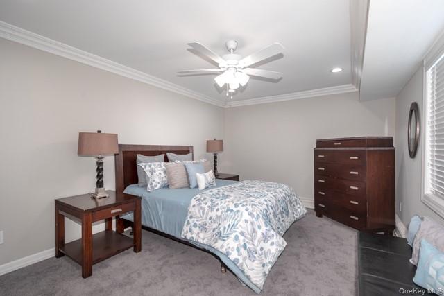 713 Terrace Road, Unit I7713 Bayport, NY 11705 - Photo 7 of 8 a bedroom with a bed and dresser