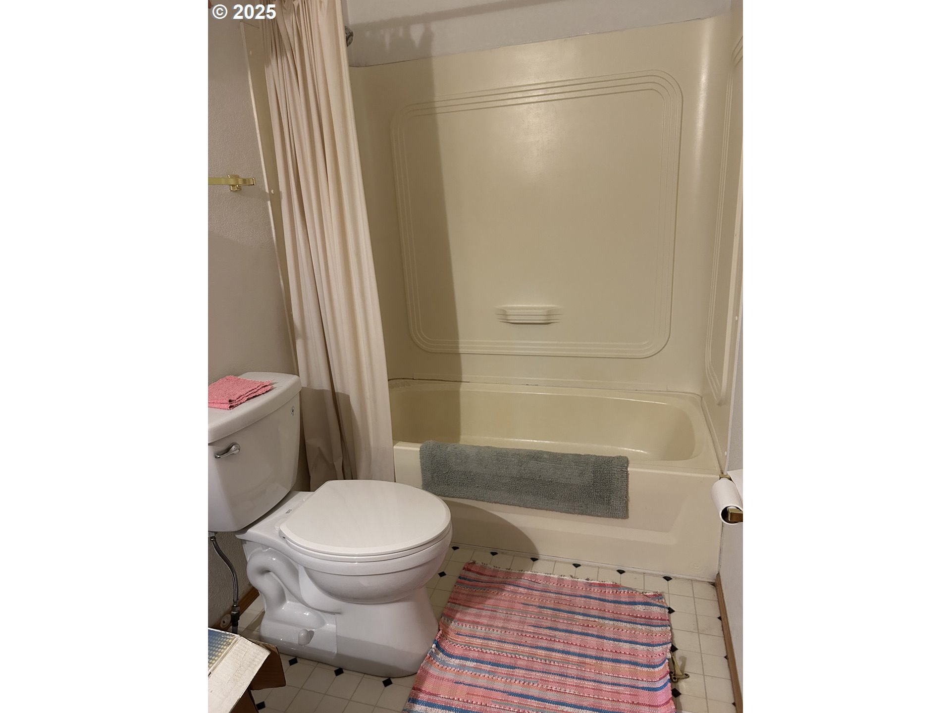 1105 Riverside Drive, Unit 17 Vernonia, OR 97064 - Photo 13 of 26 a bathroom with a toilet and a shower
