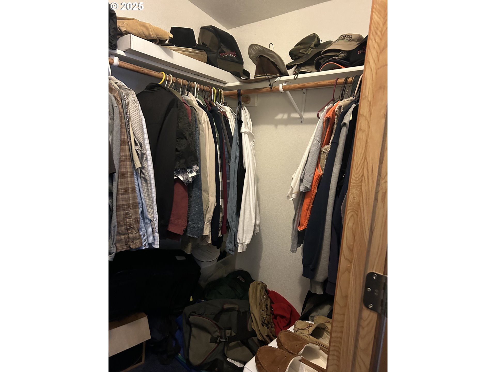 1105 Riverside Drive, Unit 17 Vernonia, OR 97064 - Photo 18 of 26 a view of walk in closet with clothes and shoes