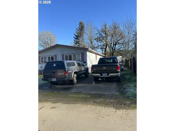 a car parked in front of a house