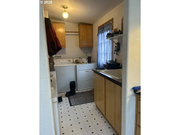 a view of a hallway with a white walls