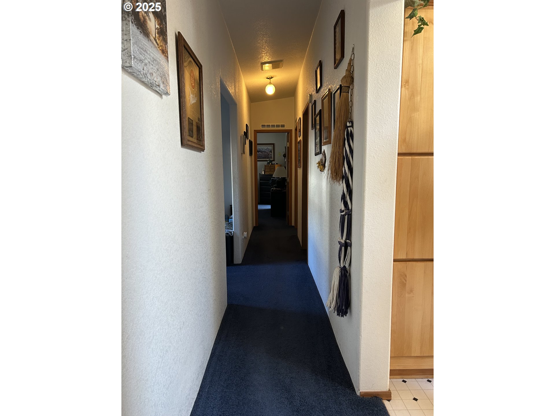 1105 Riverside Drive, Unit 17 Vernonia, OR 97064 - Photo 9 of 26 a view of a hallway with a white walls