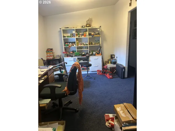 a work place with furniture and window
