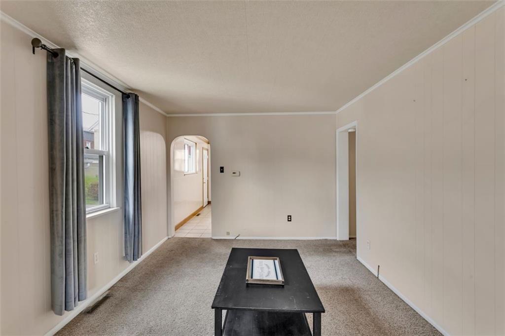 323 Sycamore Street Vandergrift, PA 15690 - Photo 6 of 28 a view of a livingroom with wooden floor